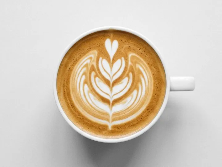 A cappuccino with latte art, seen from above